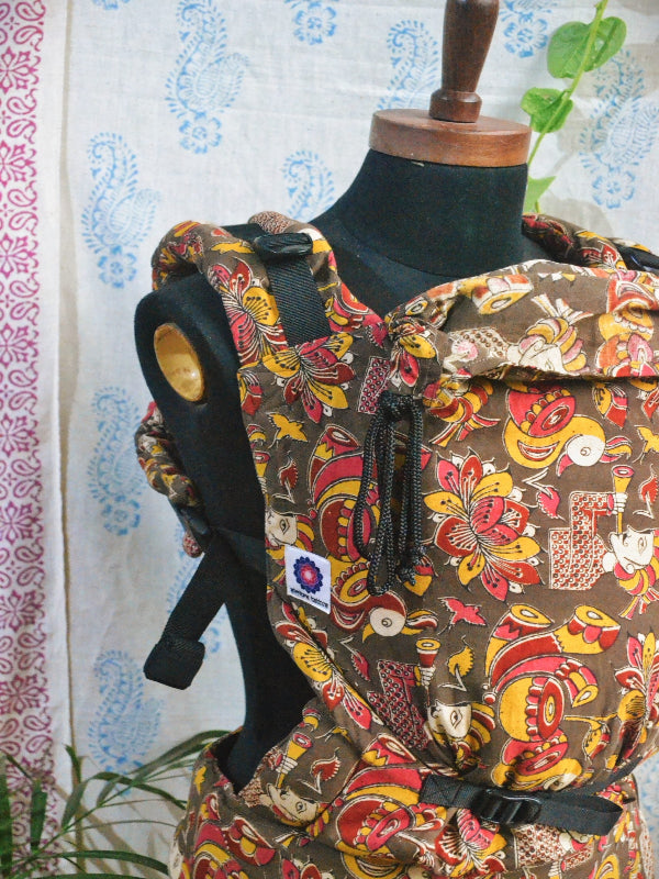 Almitra Tattva’s handcrafted Shehnai Baby Carrier, emphasizing breathable cotton and supportive waist belt with artistic motifs.