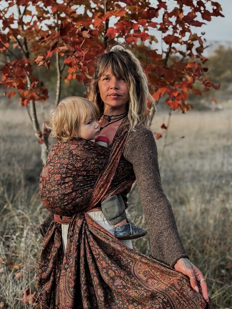 Adjustable baby carriers