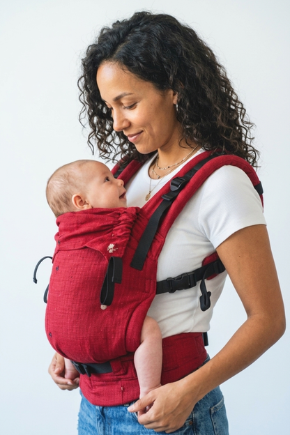 Mother and baby wearing Aruna handwoven cotton carrier
