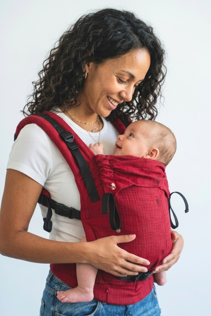 Mother and baby wearing Aruna handwoven cotton carrier