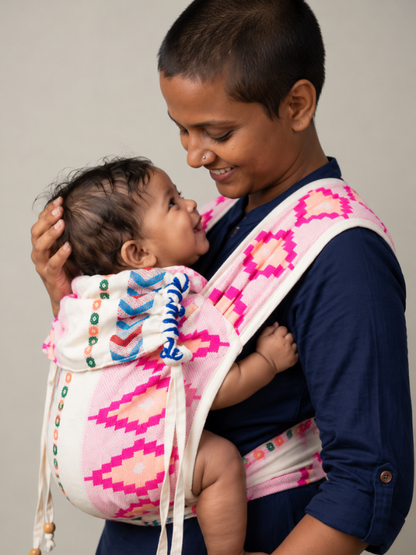 Shubra Meh Dai baby carrier showing a close babywearing view with baby