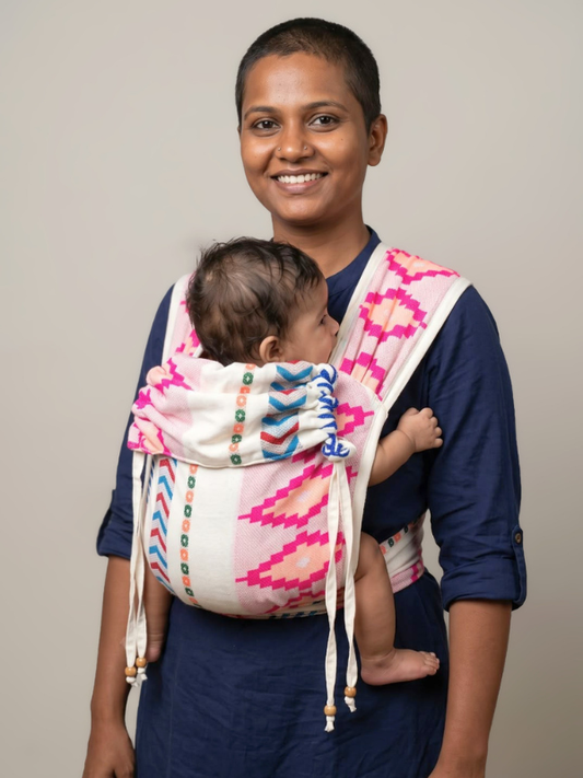 Shubra Meh Dai baby carrier in pink and white pattern, front view